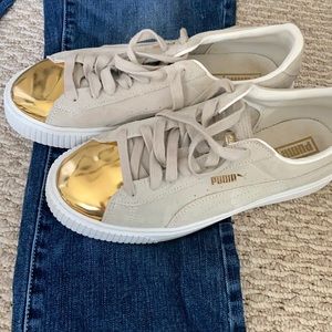 Puma women’s shoes light tan with gold toe 9.5